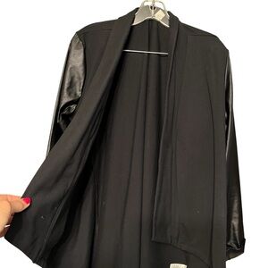 Women in Control size large black jacket with Faux leather sleeves NWOT